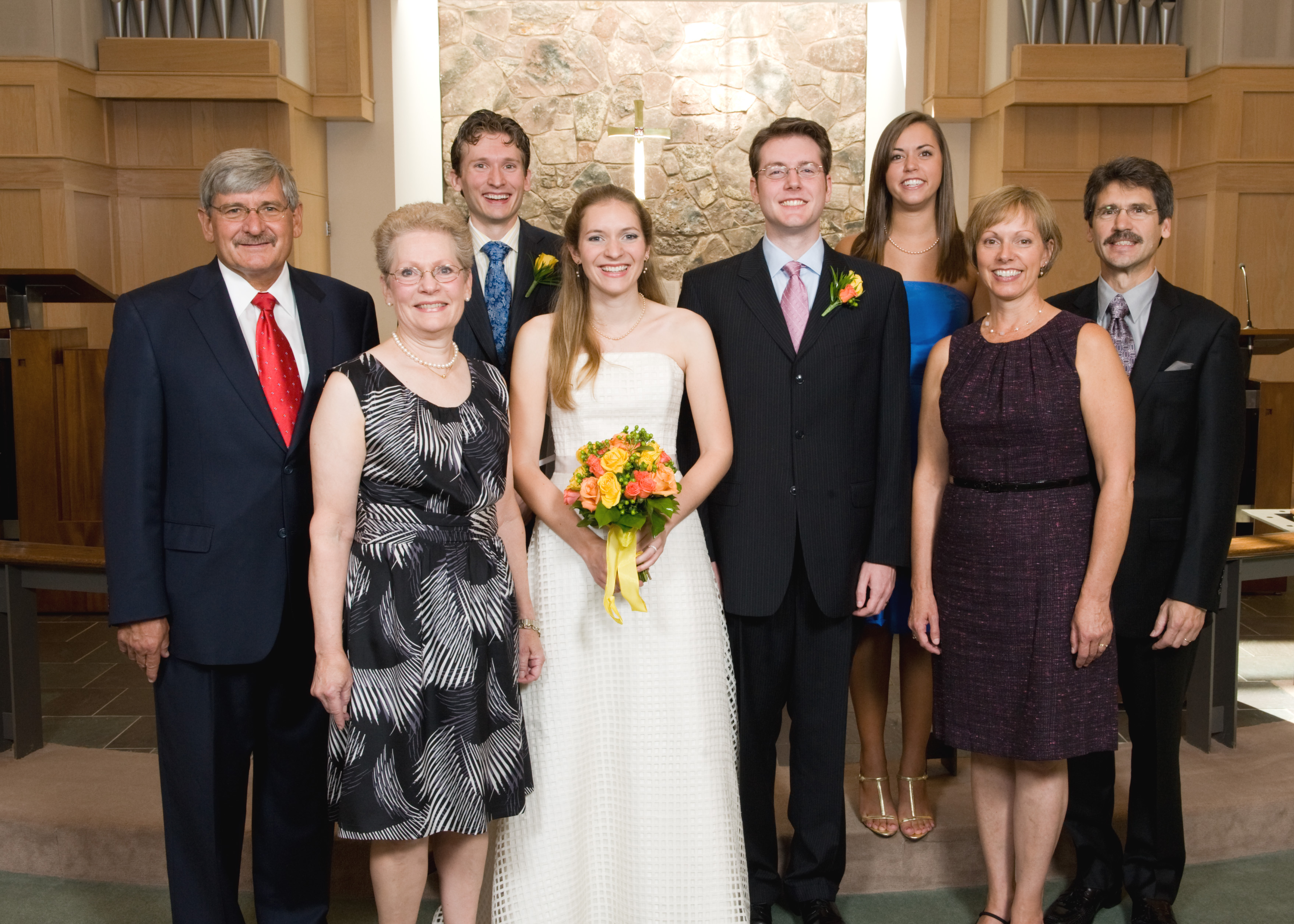 Here is a photo of us with our folks and siblings.
