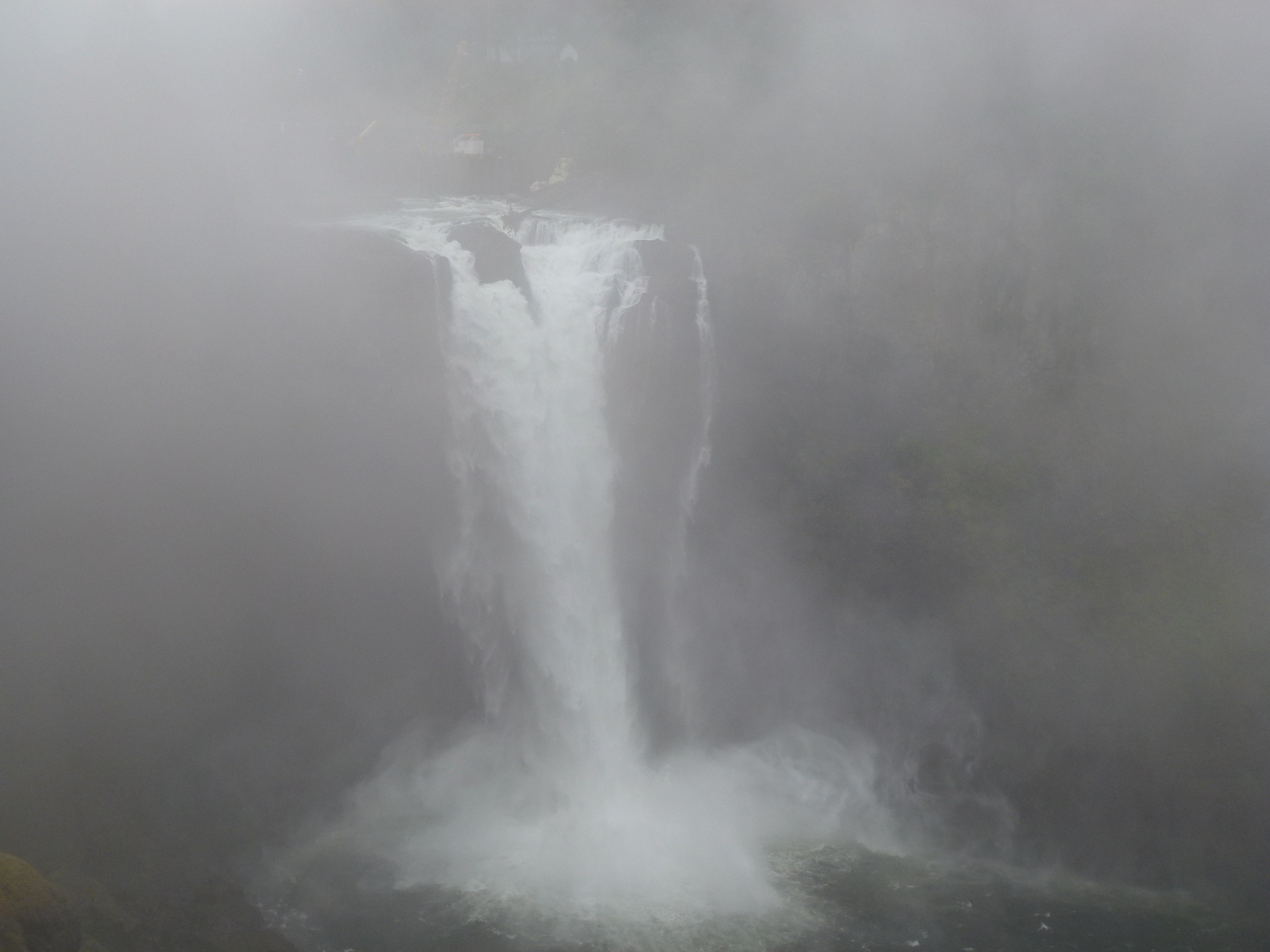 The falls emerging from the fog