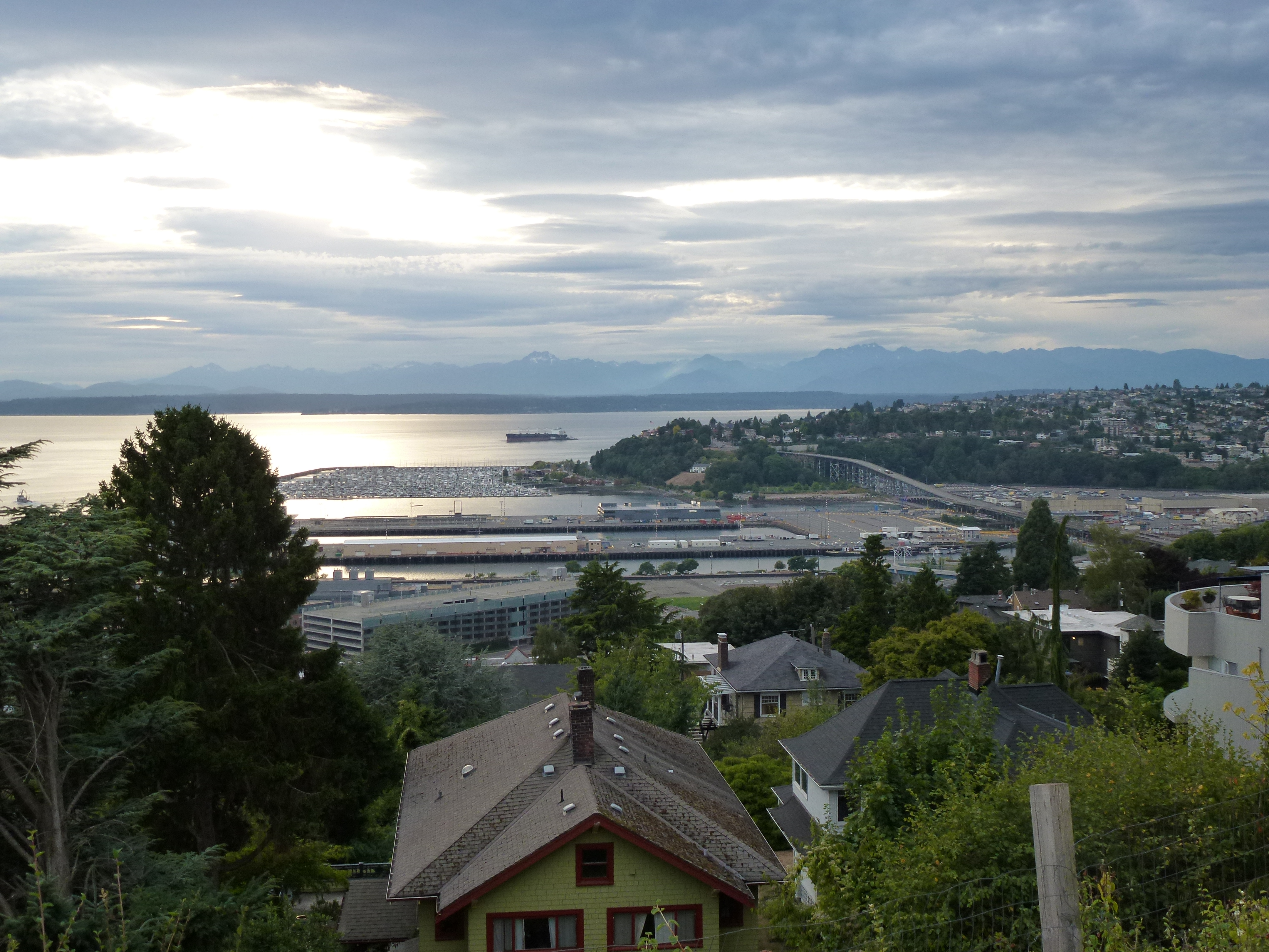 Magnolia is the land across the little bay, and the Olympics are the mountains in the background